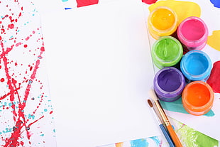 empty white printer paper beside acrylic paint